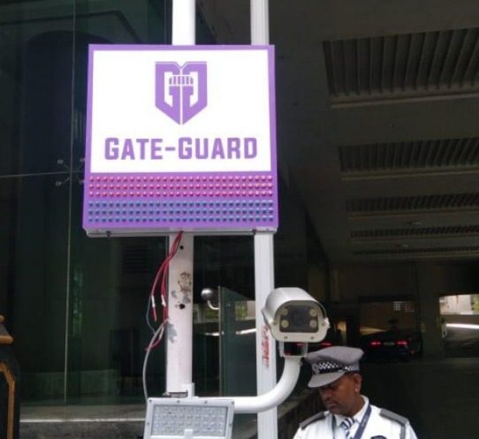 GateGuard barrier integration at Ahuja Tower vehicle access lane